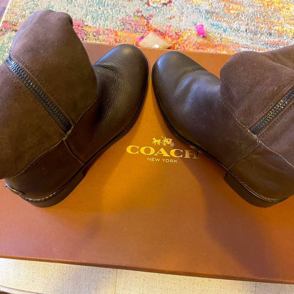 Coach Woman’s suede leather boots.